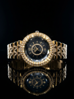 Recent ladies black dial golden diamond watch with luxury crystal bezel and gold strap